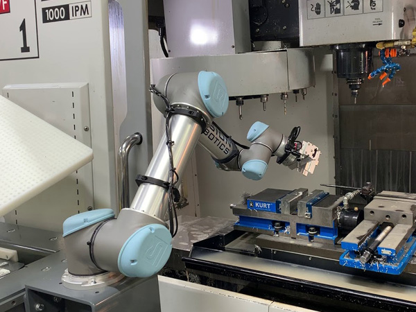 Machine Loading, Unloading & Tending Robots | Wolter Inc